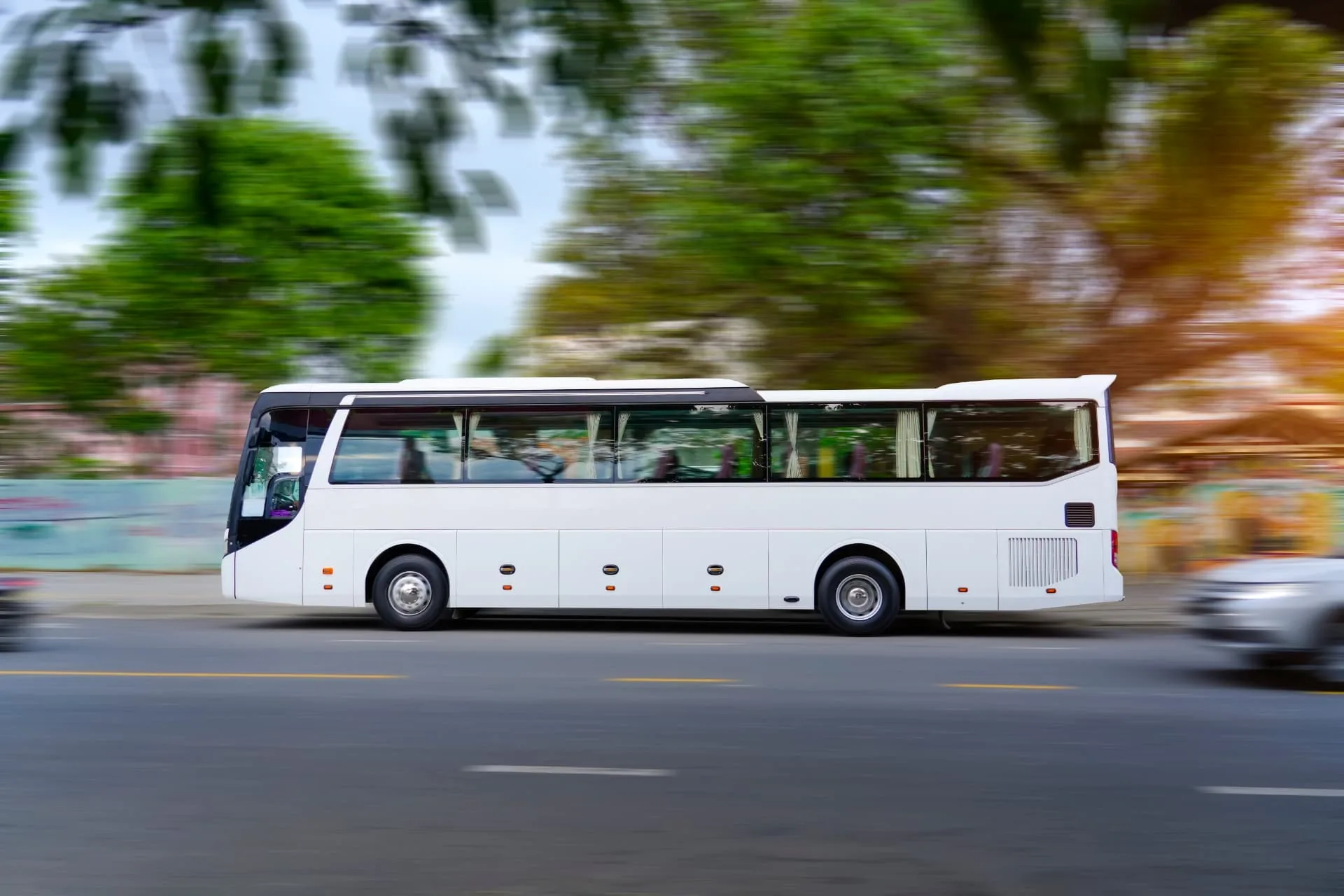 Hervey Bay Shuttle Bus Service shuttle bus parked outside a hospital entrance in Hervey Bay