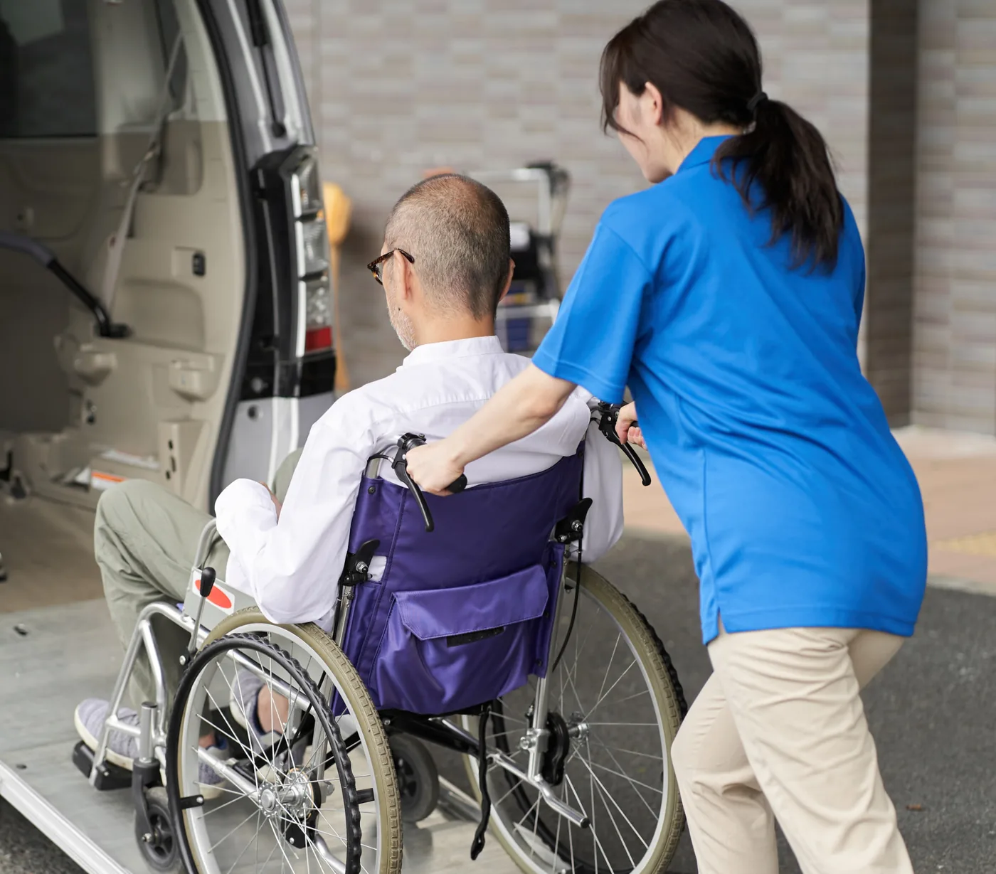 Wheelchair ramp lowered on the Hervey Bay Shuttle Bus Service van for hospital transport passengers